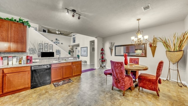 2201 Moonstone Ct, Texas City, TX 77591 - kitchen featuring dishwasher, a chandelier, brown cabinetry, a peninsula, and pendant lighting