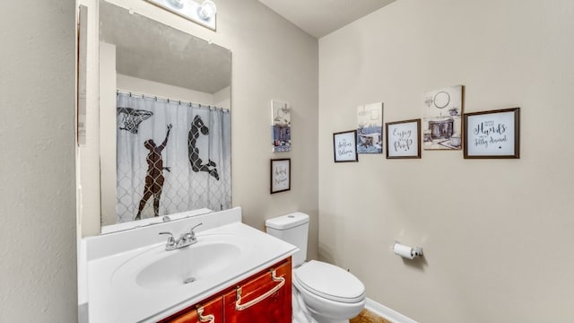 2201 Moonstone Ct, Texas City, TX 77591 - full bathroom featuring toilet and vanity