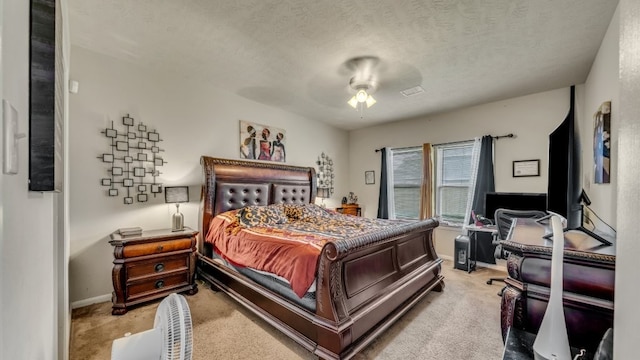 2201 Moonstone Ct, Texas City, TX 77591 - bedroom with baseboards, light colored carpet, a textured ceiling, and ceiling fan