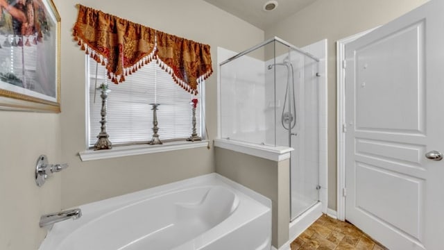 2201 Moonstone Ct, Texas City, TX 77591 - bathroom with a shower stall and a garden tub