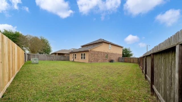 2201 Moonstone Ct, Texas City, TX 77591 - view of yard featuring central AC unit
