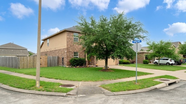 2201 Moonstone Ct, Texas City, TX 77591 - view of front of home featuring brick siding and driveway