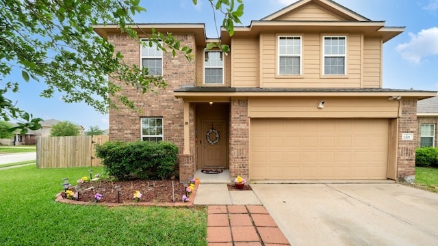 2201 Moonstone Ct, Texas City, TX 77591 - view of front of house with brick siding, concrete driveway, and a garage