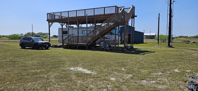 view of outbuilding with stairway