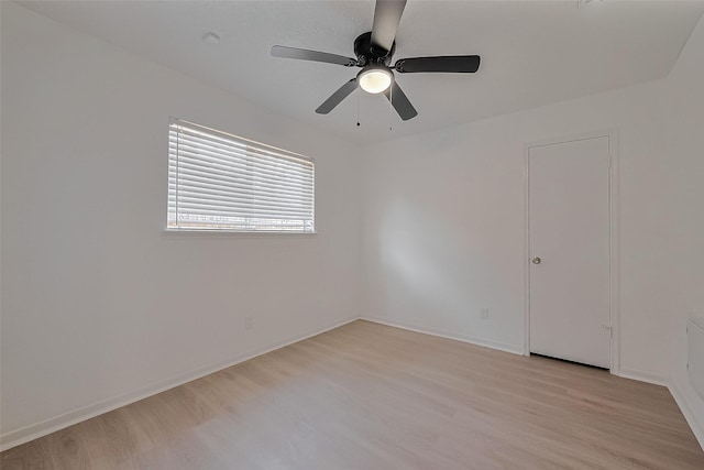 6219 Canada Dr, Pasadena, TX 77505 - spare room featuring baseboards, light wood-style flooring, and a ceiling fan