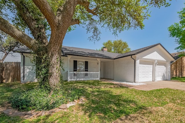 6219 Canada Dr, Pasadena, TX 77505 - single story home with covered porch, concrete driveway, fence, an attached garage, and brick siding
