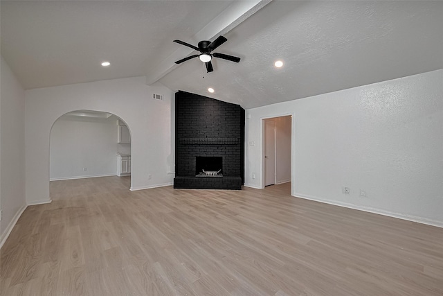 6219 Canada Dr, Pasadena, TX 77505 - unfurnished living room featuring lofted ceiling with beams, ceiling fan, visible vents, and light wood-style floors