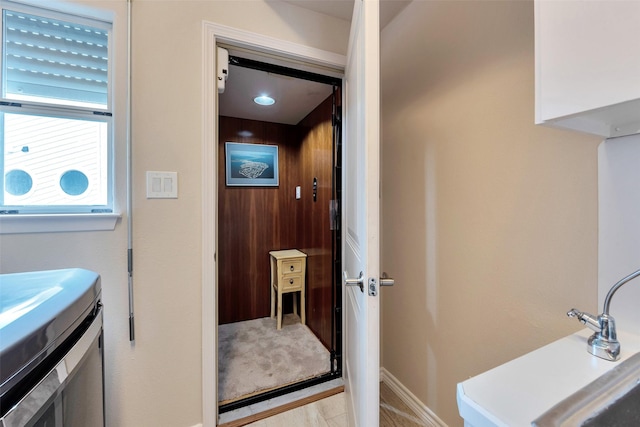 bathroom with baseboards