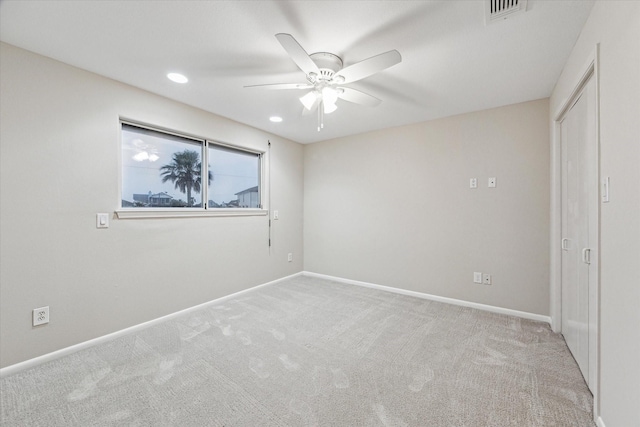 301 Isles End Rd, Tiki Island, TX 77554 - unfurnished bedroom with carpet flooring, baseboards, ceiling fan, and recessed lighting