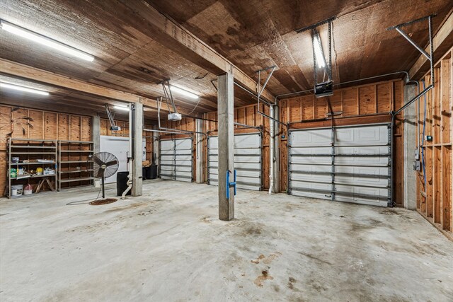 301 Isles End Rd, Tiki Island, TX 77554 - garage featuring a garage door opener