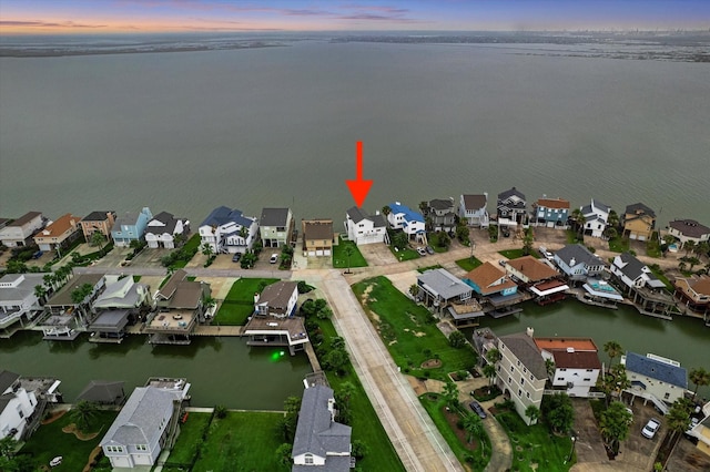 301 Isles End Rd, Tiki Island, TX 77554 - aerial view of property and surrounding area featuring a large body of water and nearby suburban area