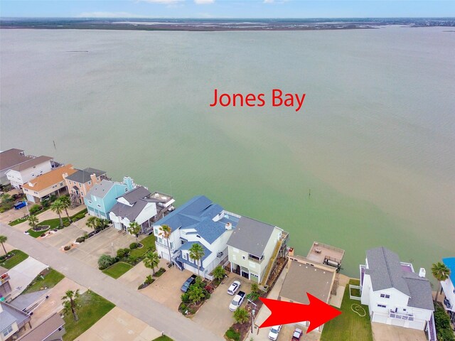 301 Isles End Rd, Tiki Island, TX 77554 - aerial perspective of suburban area featuring a nearby body of water