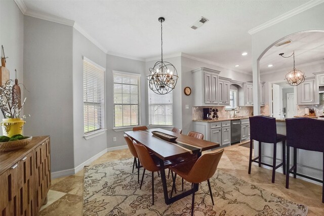 27603 Siandra Creek Ln, Spring, TX 77386 - dining area with a chandelier, healthy amount of natural light, arched walkways, crown molding, and light tile patterned flooring