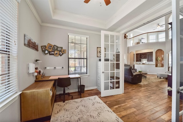 27603 Siandra Creek Ln, Spring, TX 77386 - office space with a ceiling fan, healthy amount of natural light, wood finished floors, arched walkways, and ornamental molding