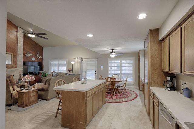 900 Manchester Dr, Conroe, TX 77304 - kitchen with ceiling fan, dishwasher, light countertops, a kitchen island, and recessed lighting