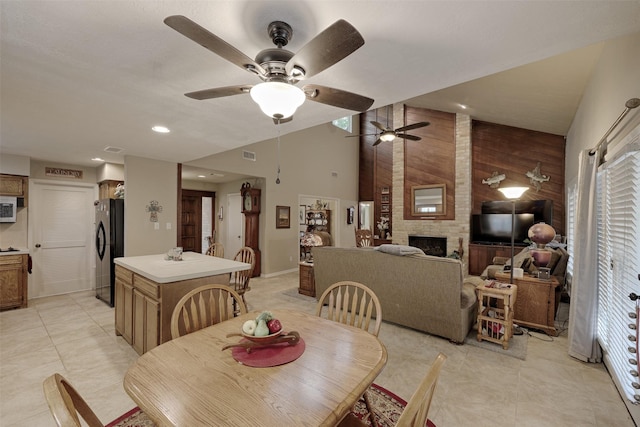 900 Manchester Dr, Conroe, TX 77304 - dining room featuring a ceiling fan, lofted ceiling, baseboards, healthy amount of natural light, and recessed lighting