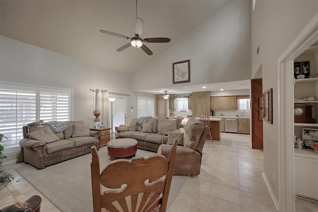 900 Manchester Dr, Conroe, TX 77304 - living room featuring ceiling fan, high vaulted ceiling, and light tile patterned flooring