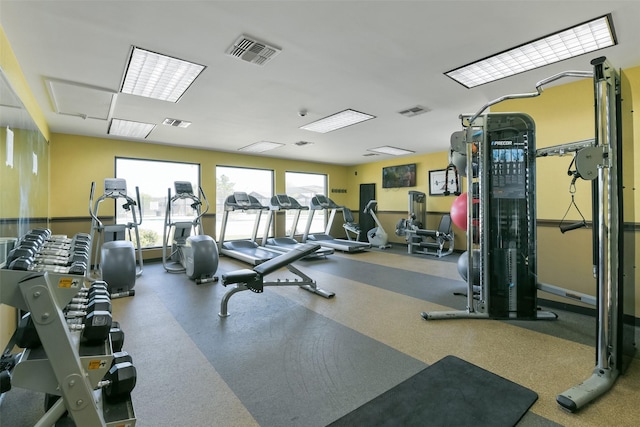 workout area featuring visible vents