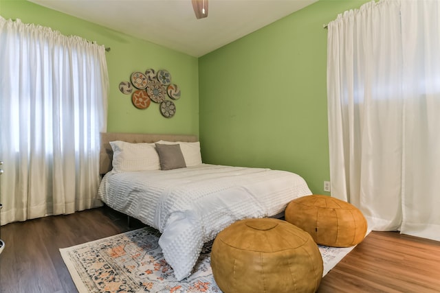 bedroom featuring ceiling fan and wood finished floors