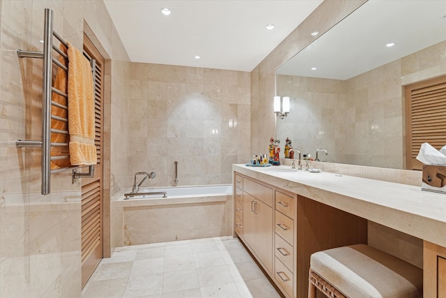 3266 Locke Ln, Houston, TX 77019 - bathroom featuring tile walls, a bath, vanity, recessed lighting, and radiator