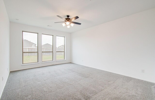 693 Cape Capri Dr, Katy, TX 77493 - carpeted spare room featuring baseboards, visible vents, and a ceiling fan