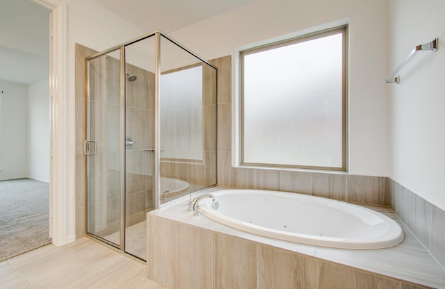 693 Cape Capri Dr, Katy, TX 77493 - bathroom featuring a jetted tub and a stall shower