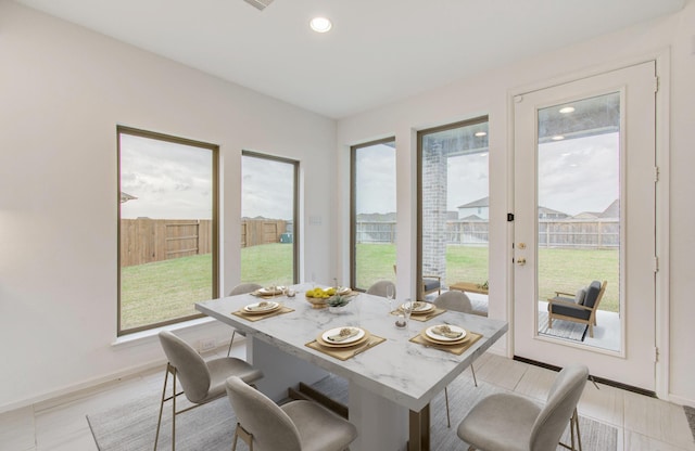 693 Cape Capri Dr, Katy, TX 77493 - dining space featuring baseboards and recessed lighting