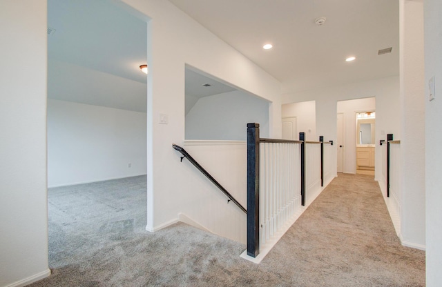 693 Cape Capri Dr, Katy, TX 77493 - hall with baseboards, an upstairs landing, recessed lighting, and carpet