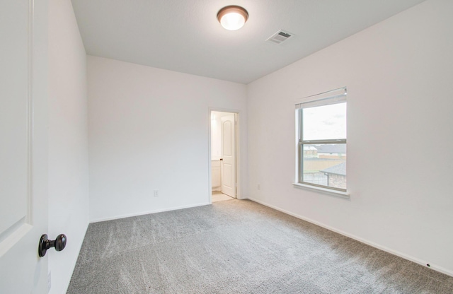 693 Cape Capri Dr, Katy, TX 77493 - carpeted empty room featuring baseboards and visible vents