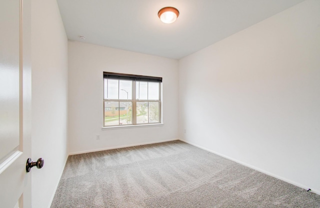 693 Cape Capri Dr, Katy, TX 77493 - unfurnished room with baseboards and carpet floors