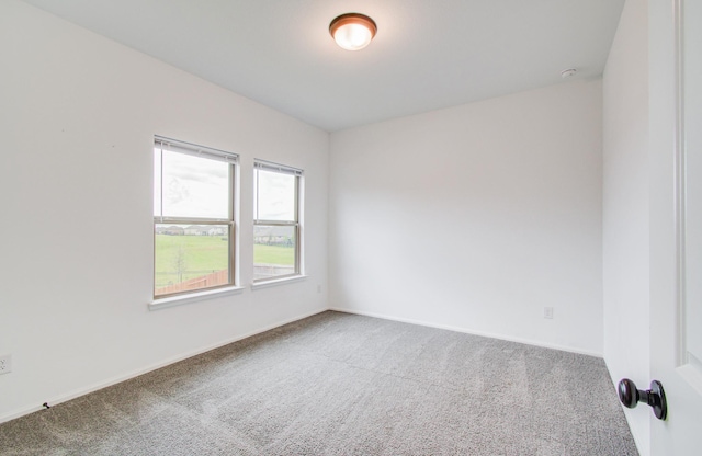 693 Cape Capri Dr, Katy, TX 77493 - empty room with baseboards and carpet floors