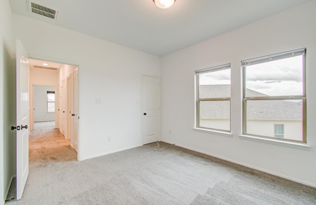 693 Cape Capri Dr, Katy, TX 77493 - carpeted spare room with baseboards and visible vents