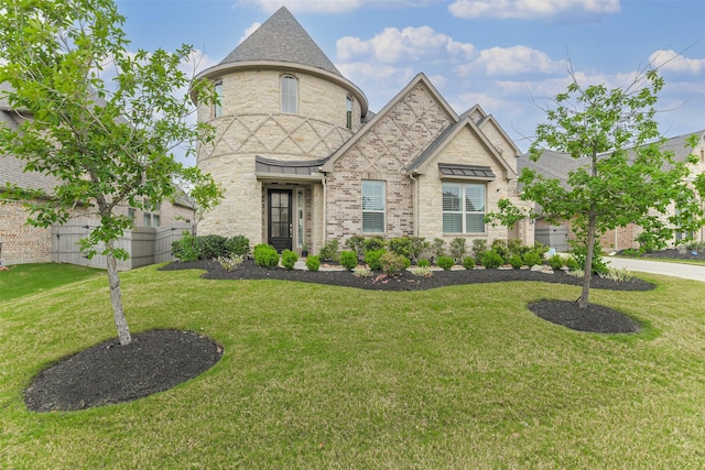 17429 Orchid Falls Ln, Conroe, TX 77302 - french country inspired facade featuring a front yard, a standing seam roof, and stone siding