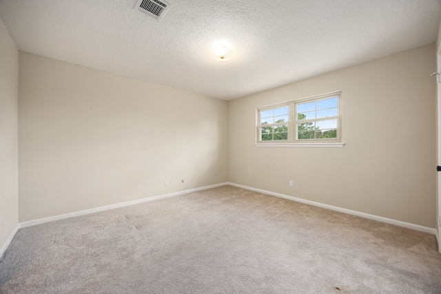 11814 Drexelbrook Dr, Houston, TX 77077 - unfurnished room featuring carpet floors and a textured ceiling