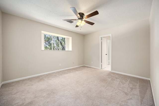 11814 Drexelbrook Dr, Houston, TX 77077 - carpeted spare room with a ceiling fan and a textured ceiling