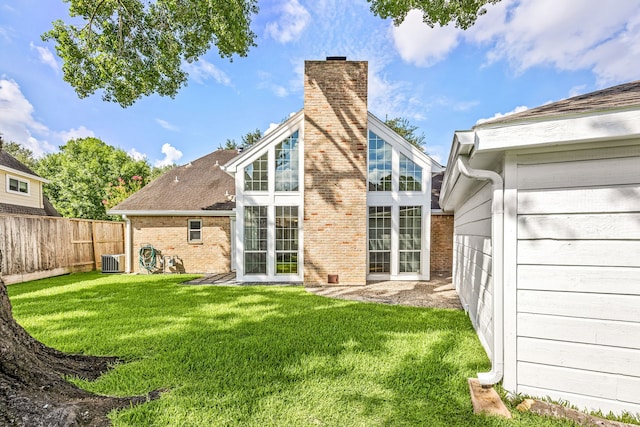 11814 Drexelbrook Dr, Houston, TX 77077 - back of property featuring brick siding and a chimney