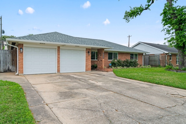 single story home featuring a garage, fence, roof with shingles, and brick siding