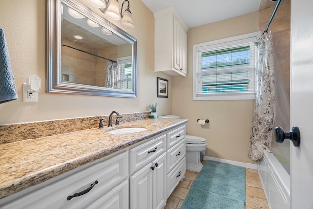 full bathroom with vanity, baseboards, shower / bath combo with shower curtain, and toilet