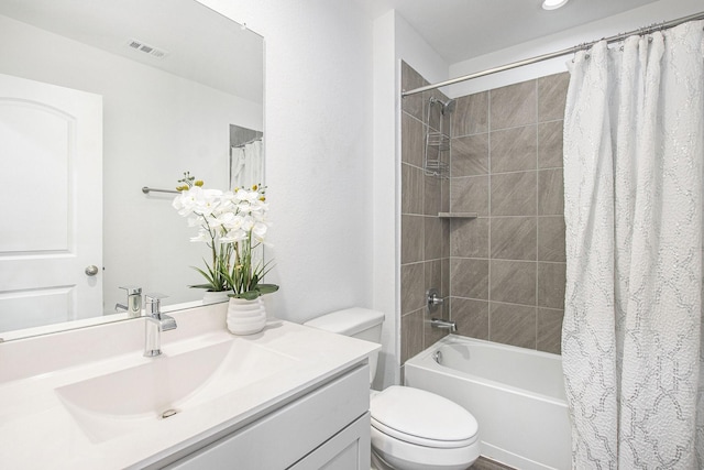 4984 Pismo Ray Dr, Katy, TX 77493 - full bathroom featuring toilet, vanity, shower / tub combo, and visible vents