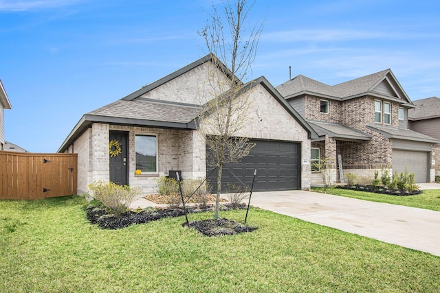 4984 Pismo Ray Dr, Katy, TX 77493 - french country home featuring a garage, a front yard, brick siding, roof with shingles, and driveway