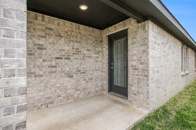 4984 Pismo Ray Dr, Katy, TX 77493 - doorway to property with a patio and brick siding