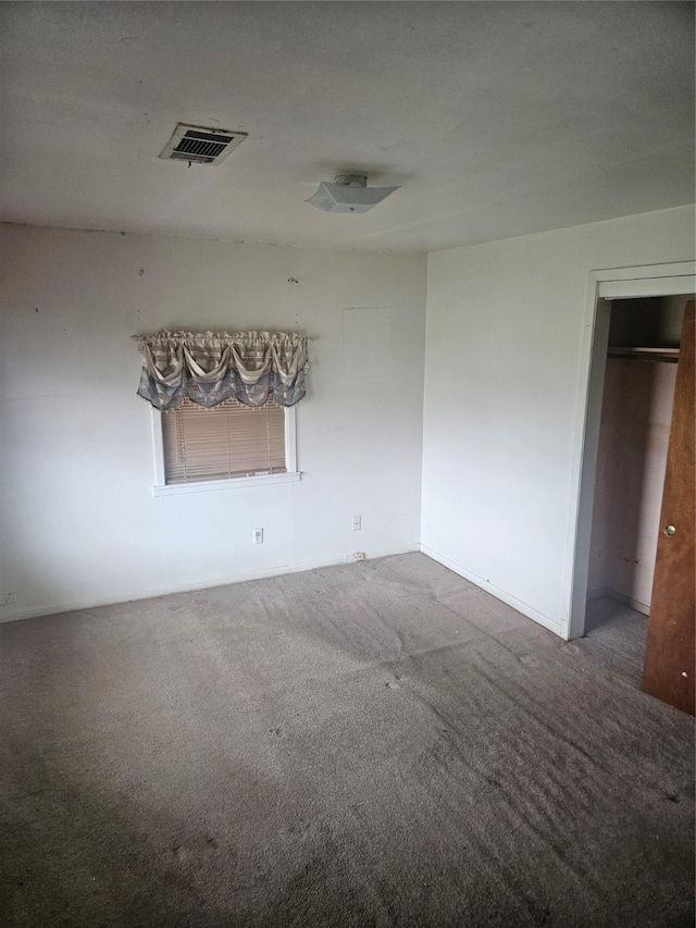 112 N Parrish St, Angleton, TX 77515 - empty room featuring carpet floors and baseboards