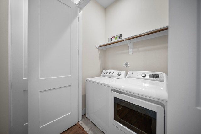 laundry area with washer and clothes dryer