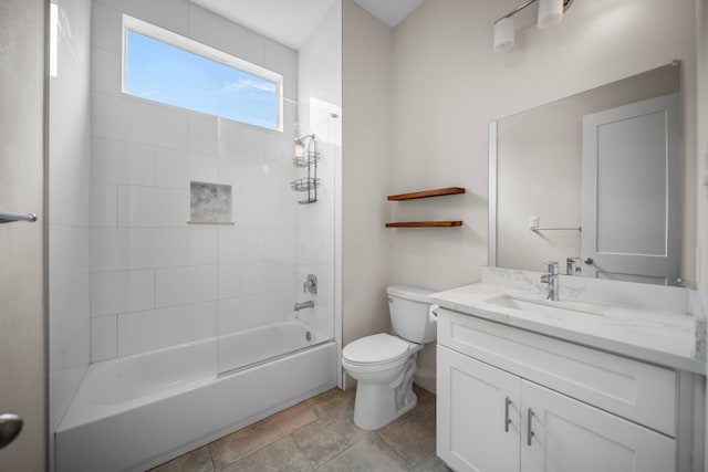 bathroom with toilet, vanity, and shower / tub combination