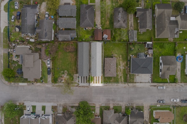 aerial perspective of suburban area with property boundaries highlighted
