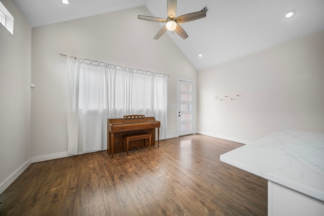 living area featuring high vaulted ceiling, wood finished floors, a ceiling fan, recessed lighting, and baseboards