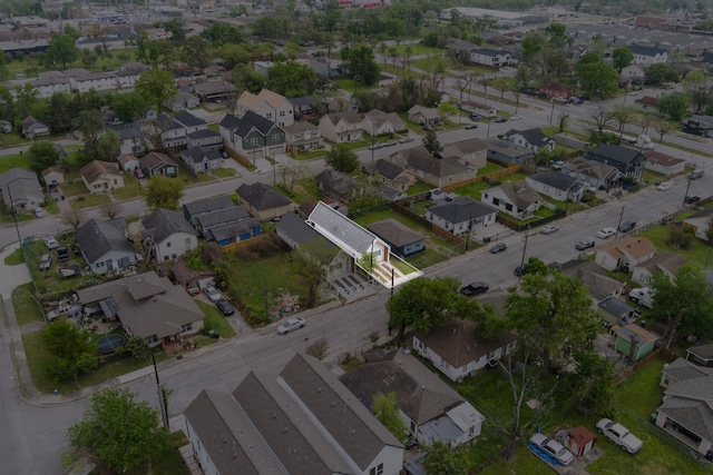 aerial view of property's location featuring nearby suburban area