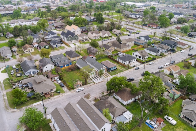 aerial view of property and surrounding area with nearby suburban area