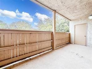view of patio featuring fence