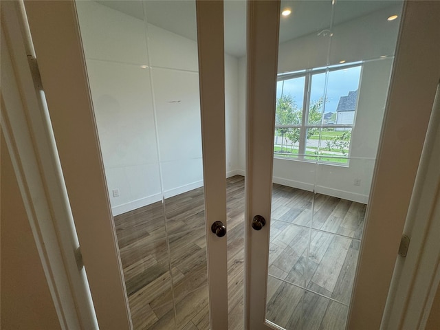 31319 Hastings Creek Ln, Fulshear, TX 77441 - empty room with wood finished floors and recessed lighting